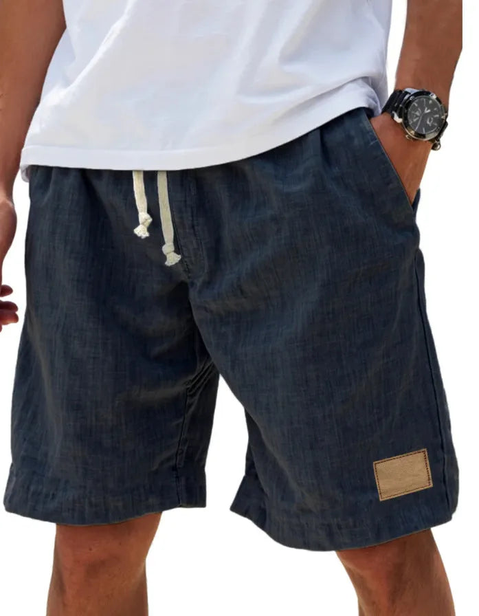 Back view of the shorts showing the fabric's natural woven texture and side seam stitching