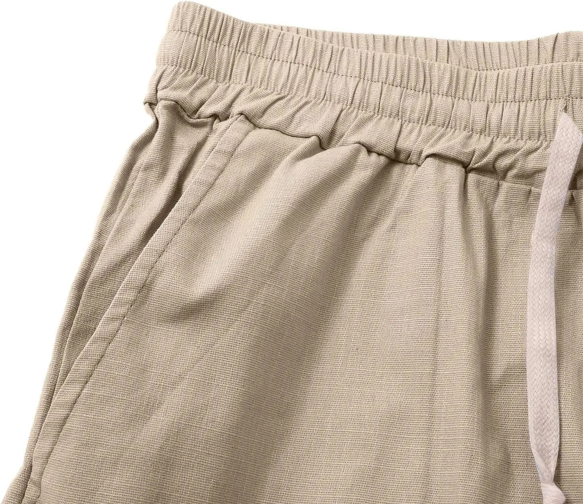 Model wearing the cotton shorts with a white t-shirt, showing overall knee-length fit