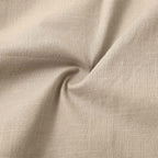 Full back view of the shorts highlighting the relaxed drape and knee-length hem