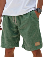 Light blue cotton shorts shown from the front, highlighting relaxed leg and hemline