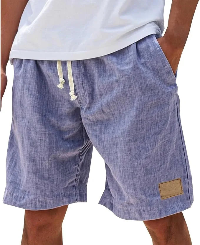 Dusty pink cotton shorts, front view showing drawstring waistband and side pockets