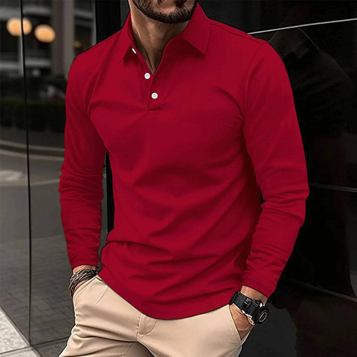 Red long-sleeve polo shirt with white buttons, showing the slim fit through the torso and sleeves