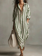 Styled look of the red striped maxi dress paired with layered gold jewellery and a canvas tote