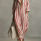 Front view of a brown and white striped maxi shirt dress with open collar and relaxed fit