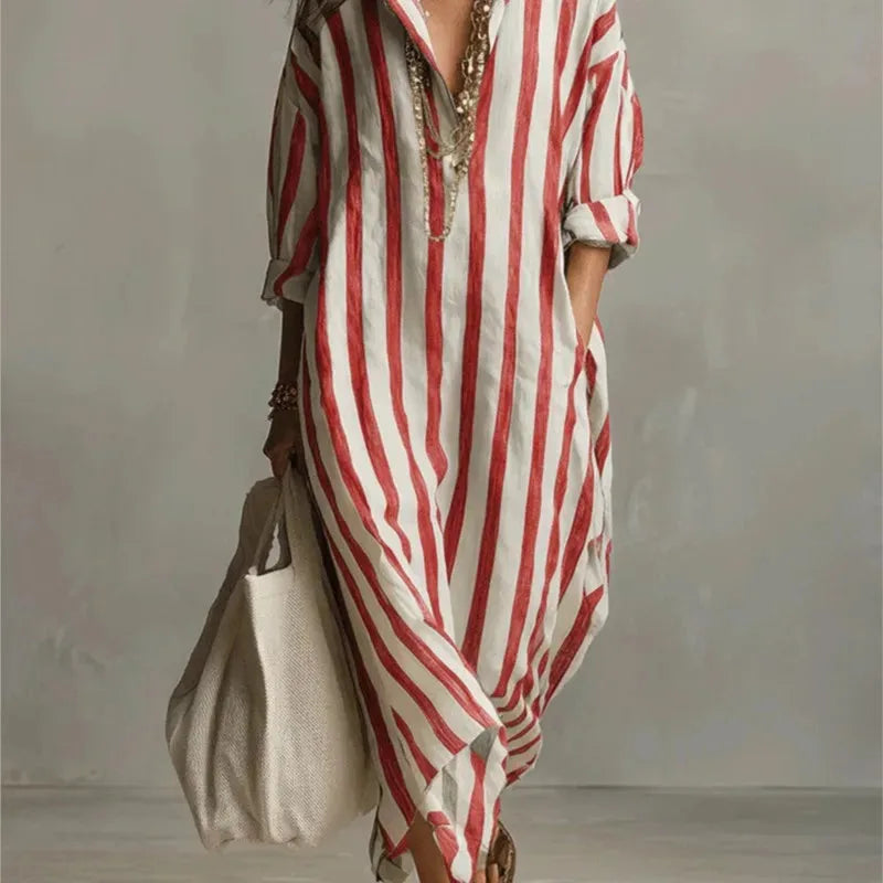 Front view of a brown and white striped maxi shirt dress with open collar and relaxed fit