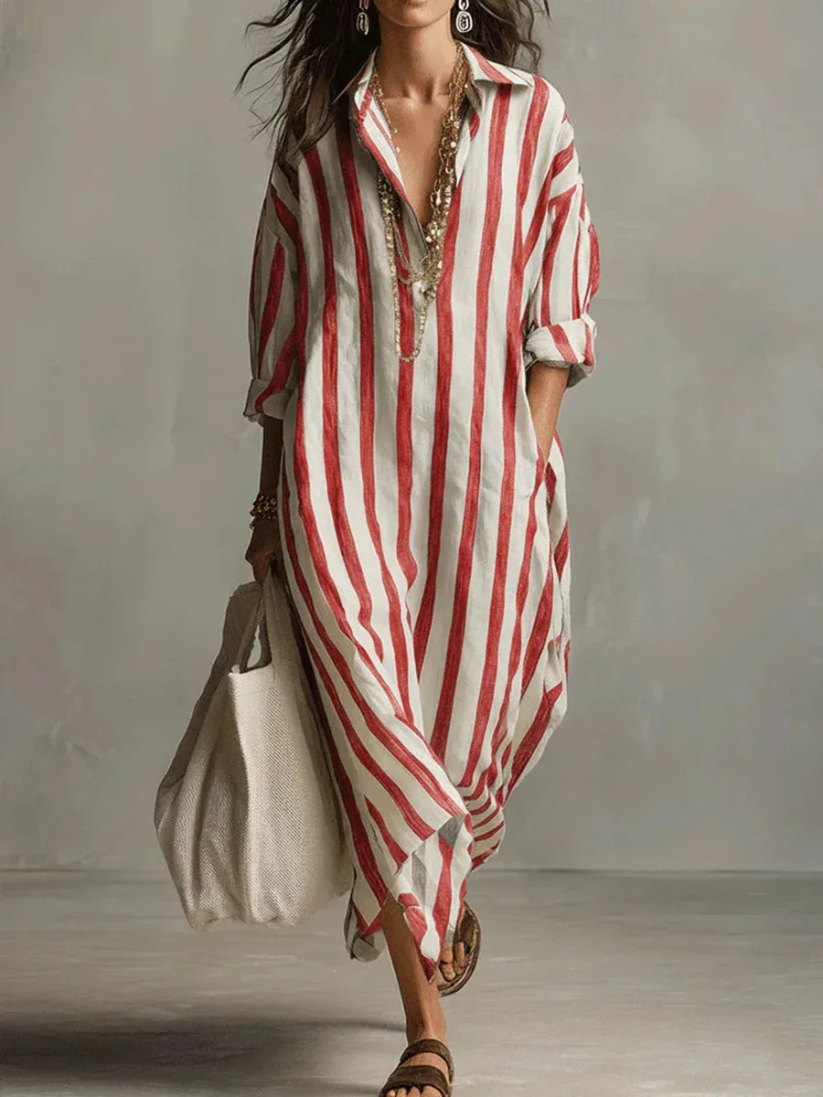 Close-up of a red and white striped maxi dress with deep V-neck and gathered sleeve