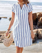 Front view highlighting the cuffed short sleeves and full button front of the striped midi dress