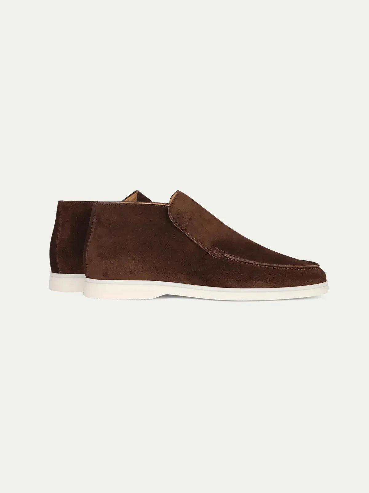 Back and side view of the pair showing the heel panel, pull tab stitching and tan leather lining