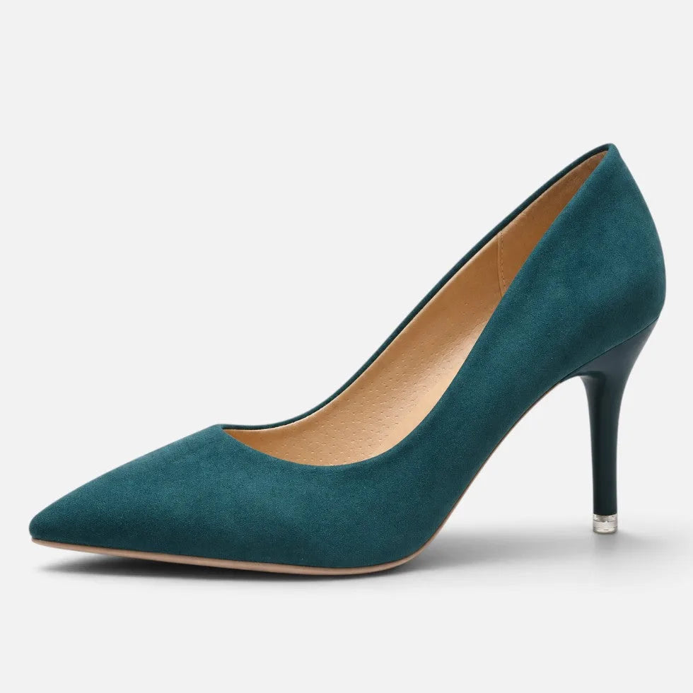 Side profile of deep teal green suede pointed toe heel with pointed toe and slim heel