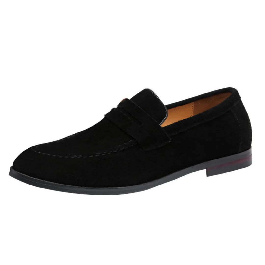 Black suede penny loafer with classic penny strap and visible front stitching