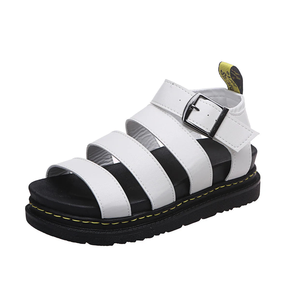 White platform sandal viewed from the side angle, highlighting the open toe and buckled ankle strap