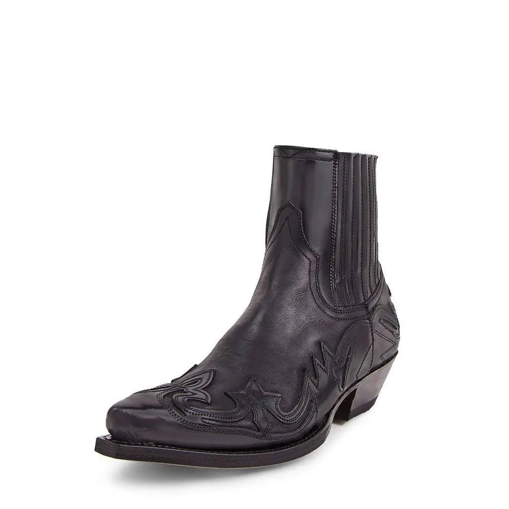 Three-quarter angled view of a black leather western ankle boot highlighting elastic side gusset and heel