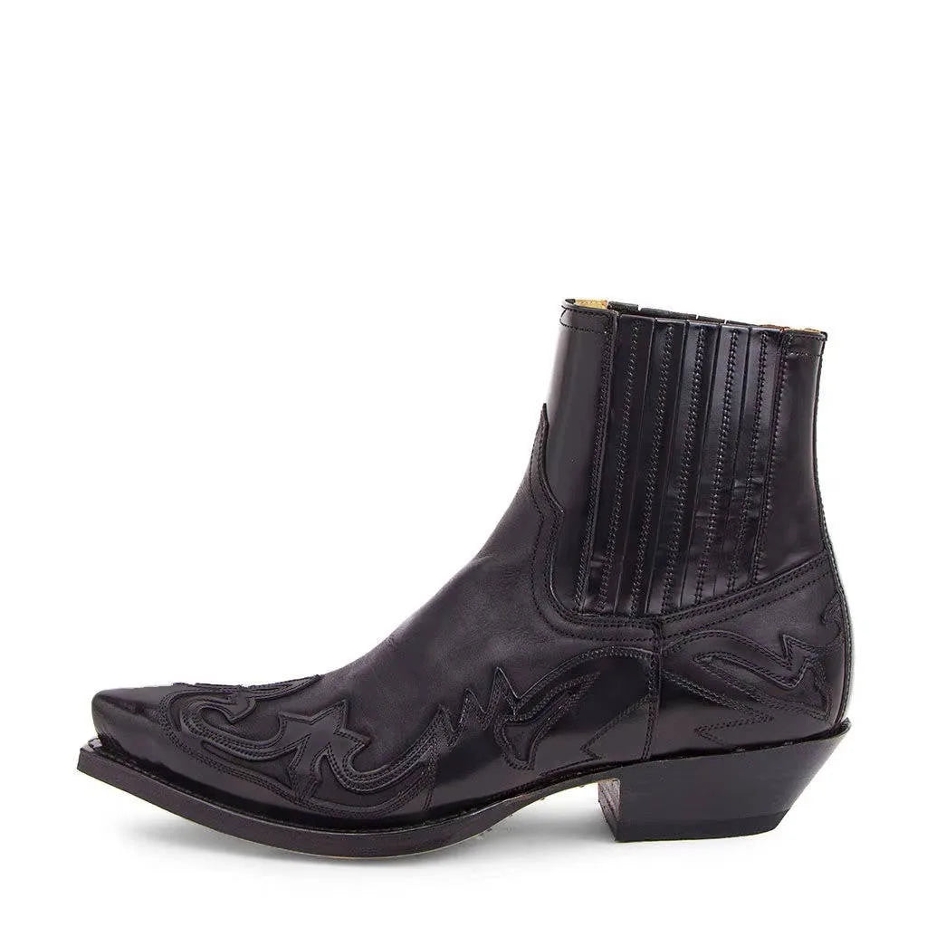 Straight side profile of a black leather western ankle boot showing full silhouette and stitched toe detail