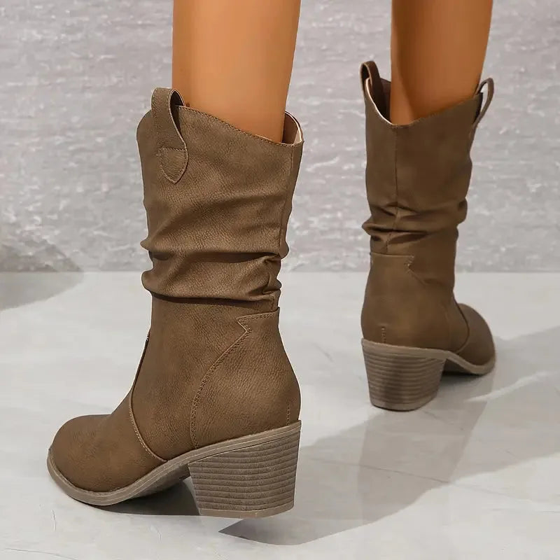 Back view of khaki brown western boots showing stacked block heel and ruched leather shaft construction